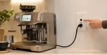 Breville Oracle Touch connected to a wall outlet for breaker troubleshooting